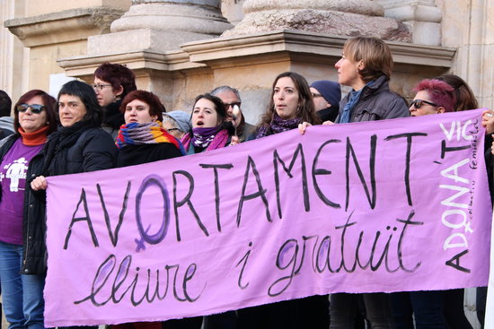 Archive image of a group of women holding a pro-abortion rights banner during a protest outside Vic Cathedral