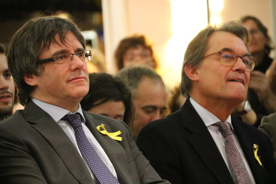 Former Catalan presidents Carles Puigdemont and Artur Mas in 2017