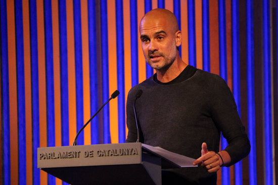 Pep Guardiola gives a speech in the Catalan parliament in 2019