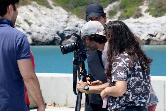 A team of photographers during an advertising session at the old Vallcarca pier, in Sitges