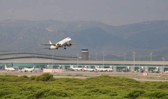 A Vueling plane takes off from Barcelona airport on September 9, 2021
