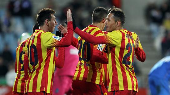Messi and Adriano celebrating Barça's first goal against Getafe (by FC Barcelona)