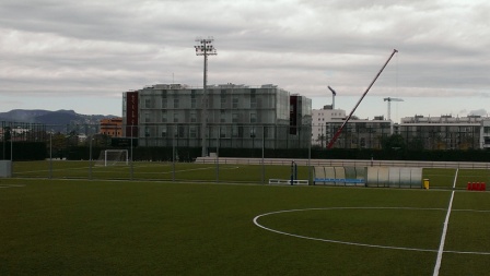Barça's La Masia building and one of the club's training fields (by H. M. Eskildsen)