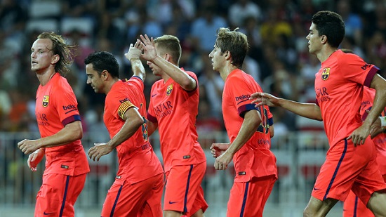 Barça players celebrating Xavi's goal against OGC Nice (by FC Barcelona)