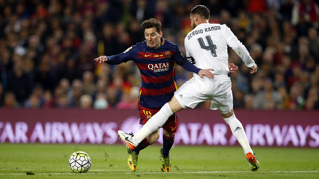Messi is tripped up by Sergio Ramos at the edge of the penalty area (by FCB)