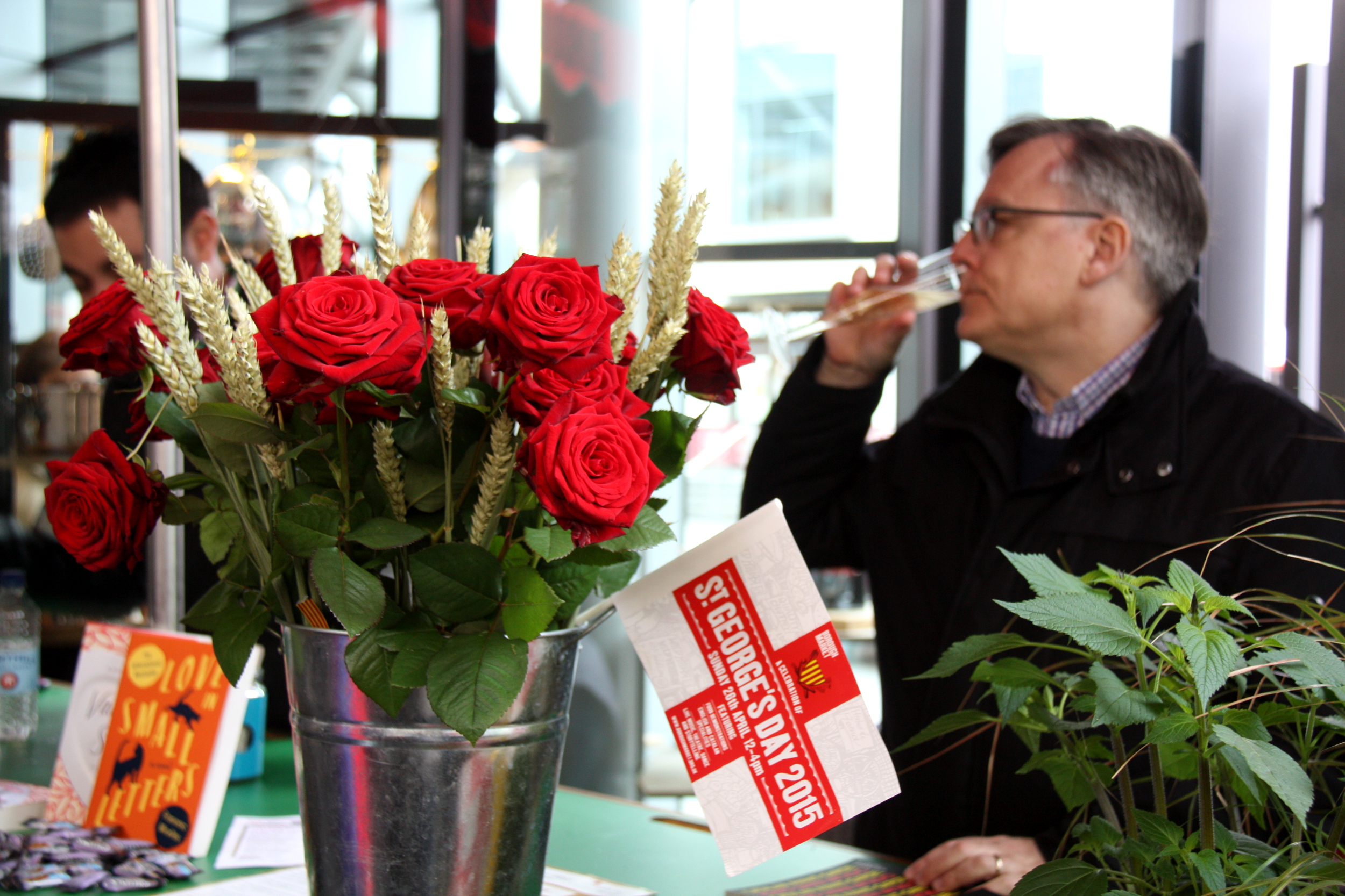 A man drinking Cava during Sant Jordi's celebration at London's Borough Market (by ACN)