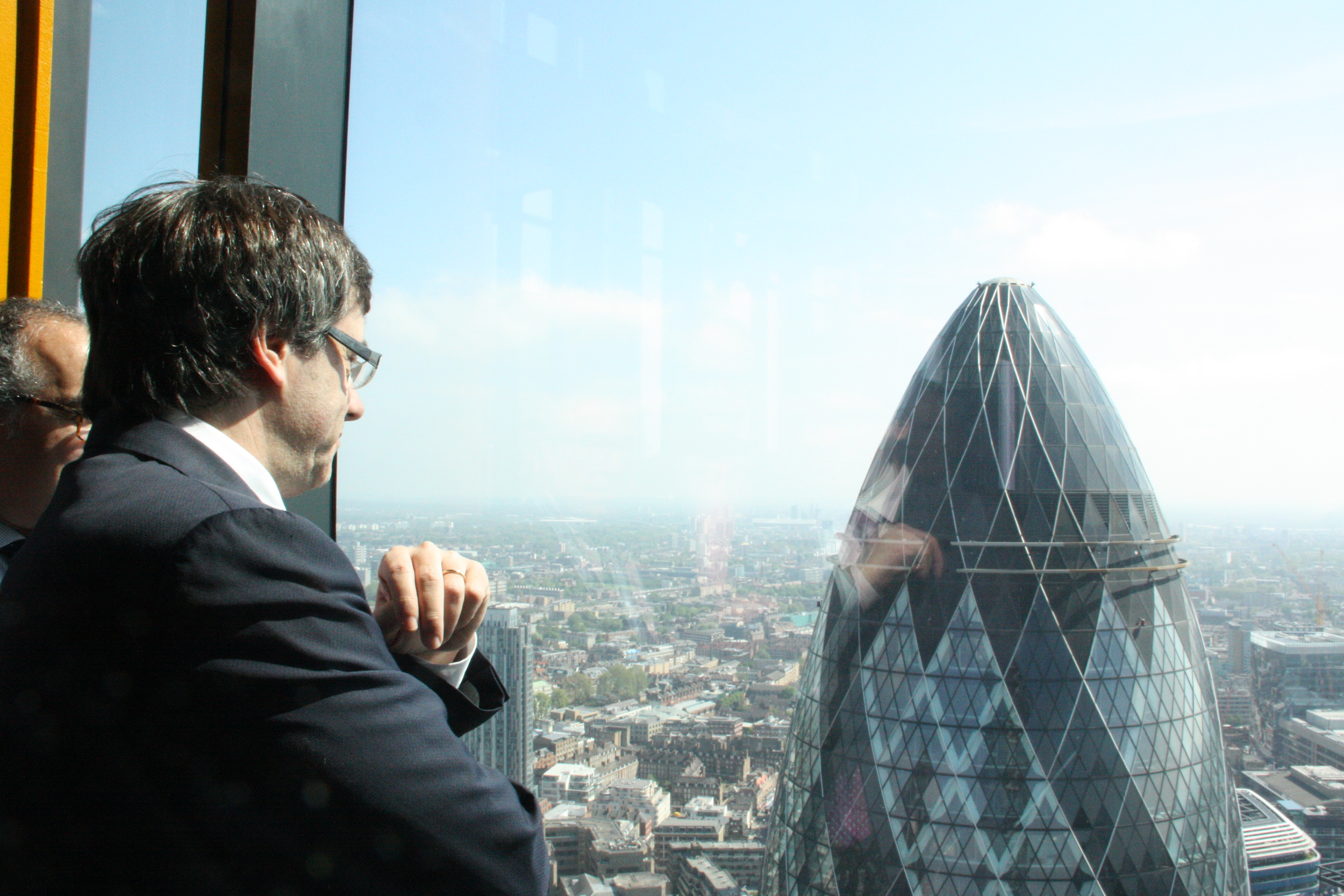 Catalan President, Carles Puigdemont, looking at London's skyline from 'Banc Sabadell' headquarters in The City