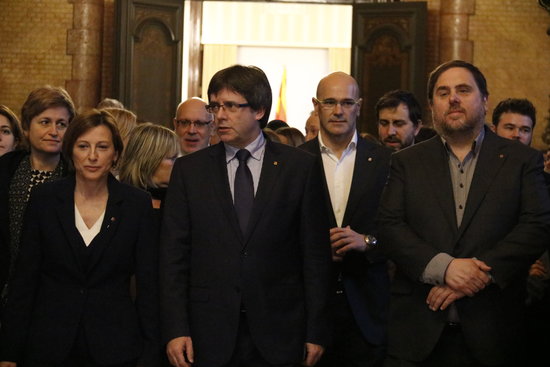 The Catalan President, Carles Puigdemont, the Vice President and Minister of Economy, Oriol Junqueras, and the Minister of Foreign Affairs, Raül Romeva, with the Catalan Parliament President Carme Forcadell (by ACN)