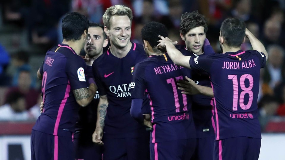 Barça players celebrating their third goal at 'Los Cármenes' (by FCB)
