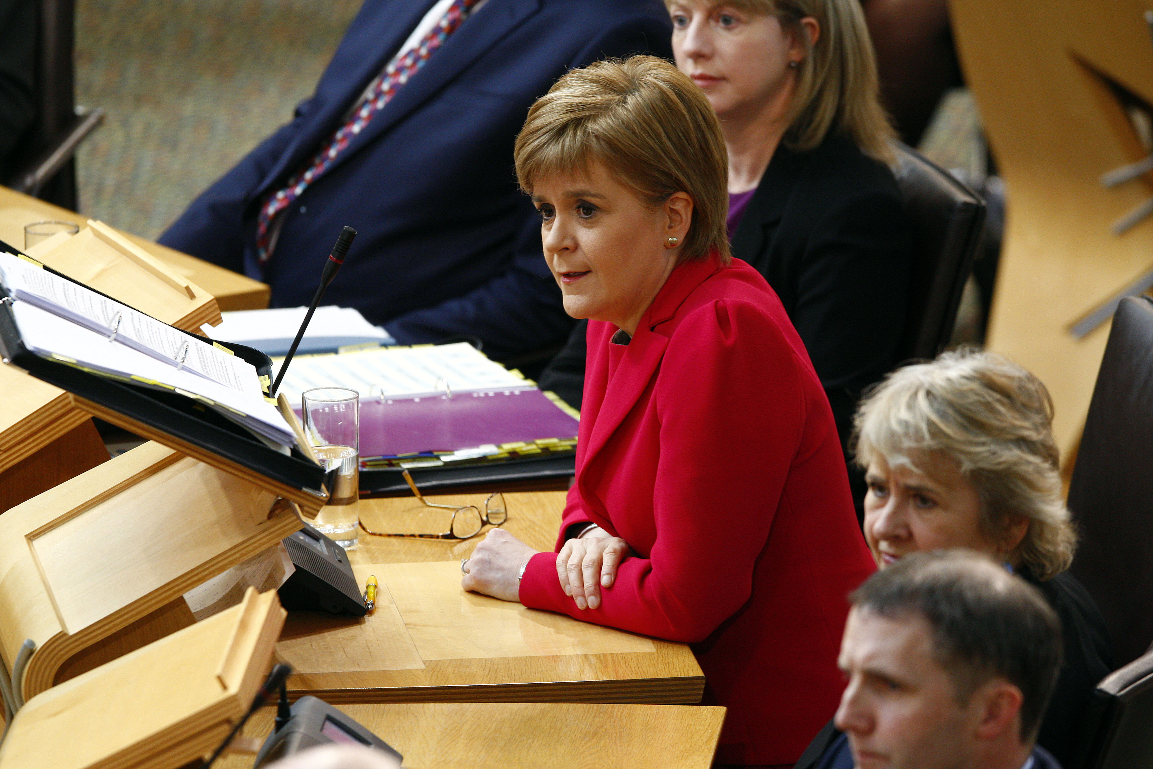 Nicola Sturgeon, First Minister of Scotland, speaking at the Scottish Parliament (by the Scottish Parliament)