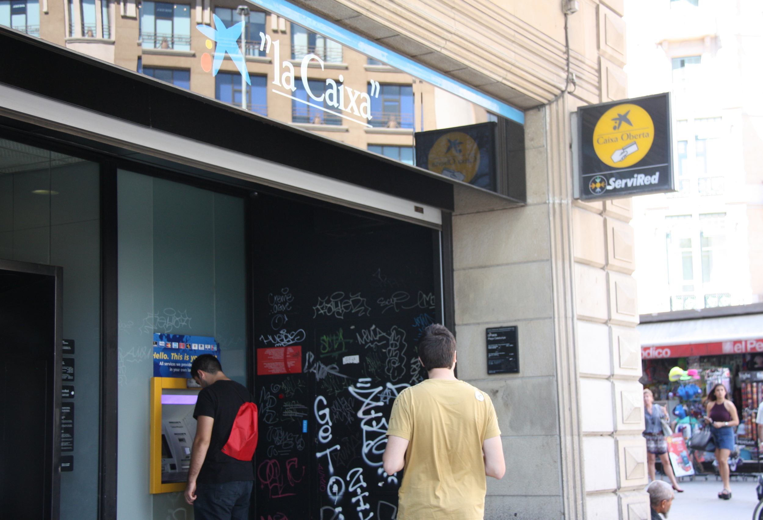 People at an ATM (by Sara Shams Azad)