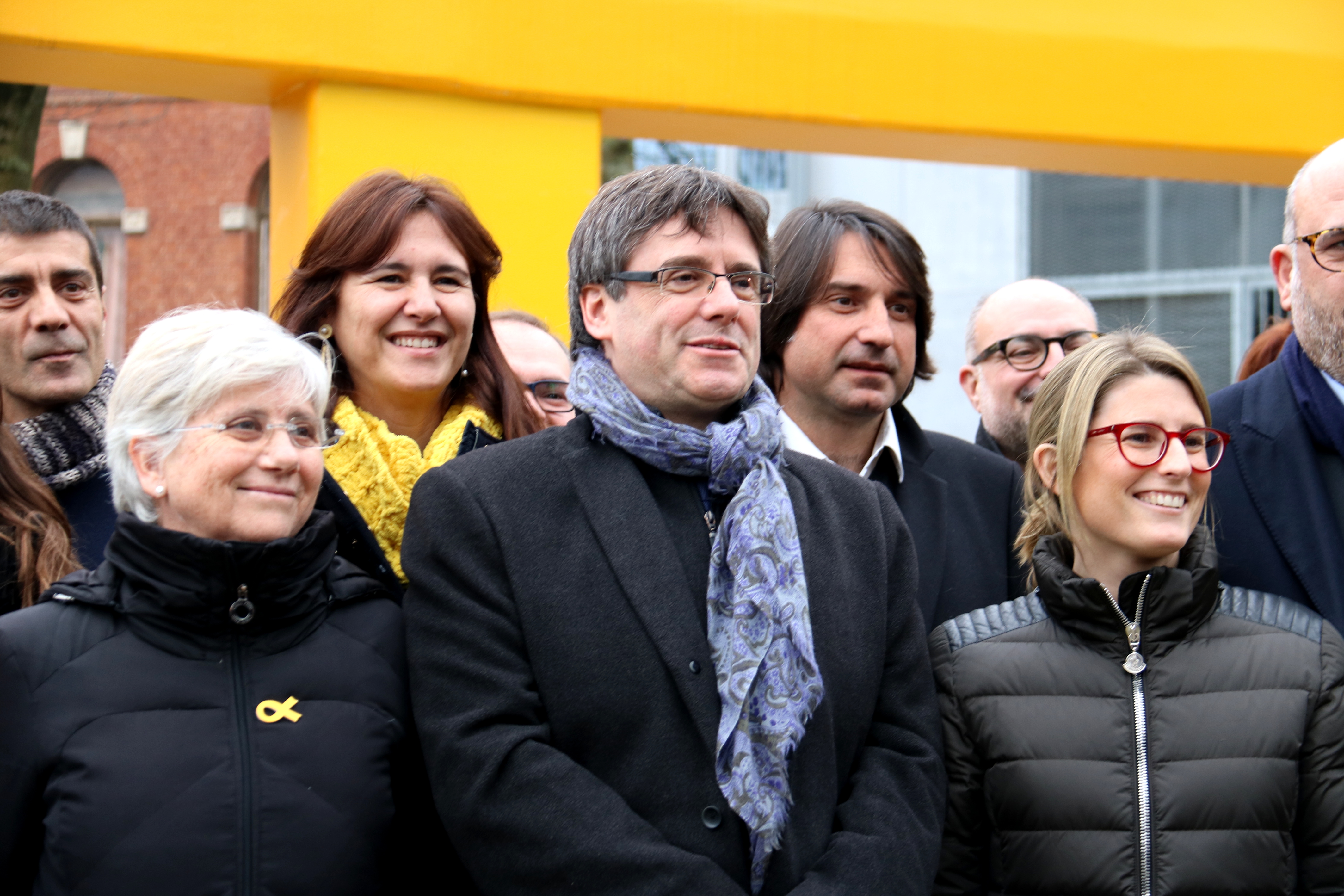 Carles Puigdemont alongside elected officials of his Together for Catalonia candidacy in Brussels on Friday (by ACN)