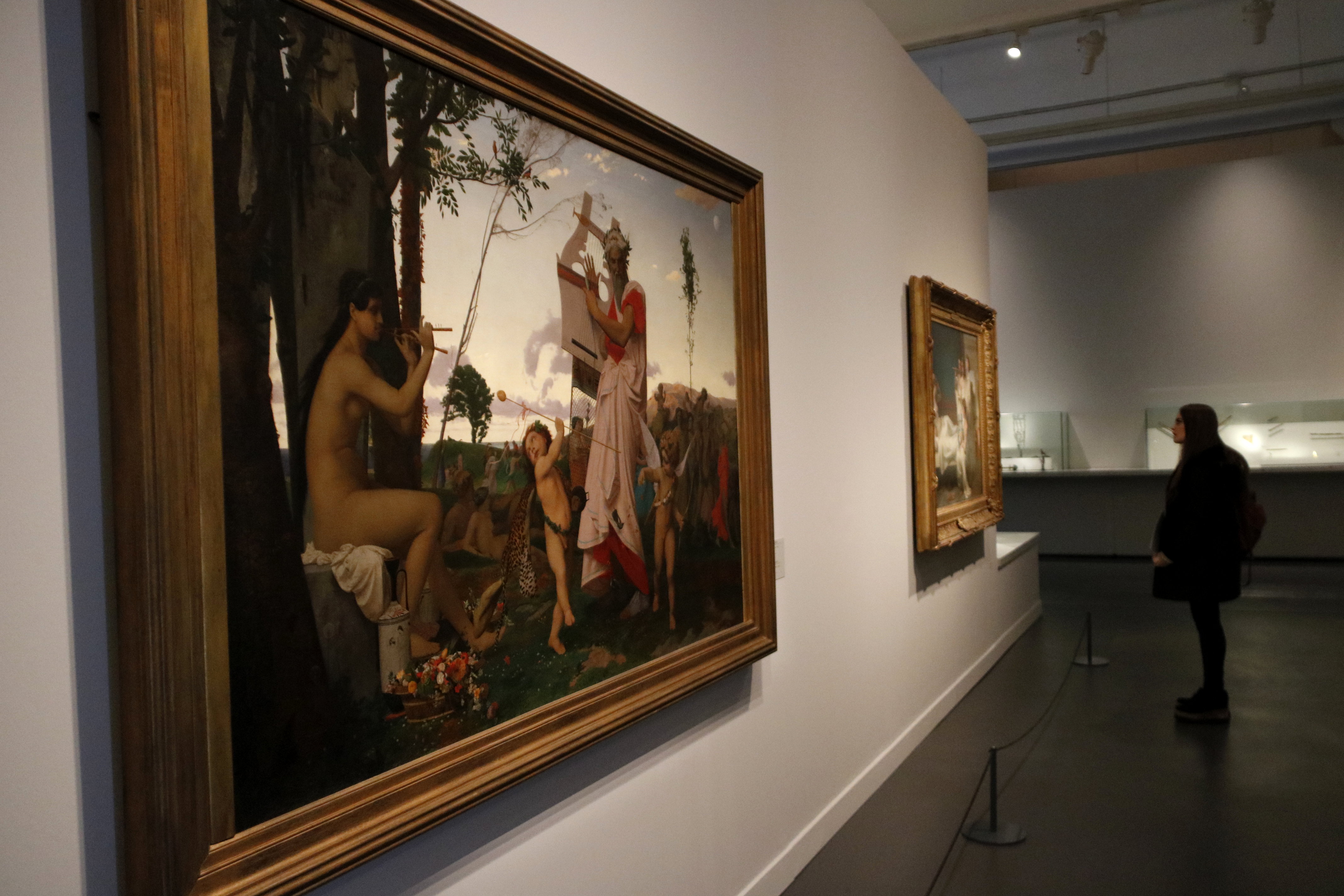 Paintings at the CaixaForum exhibit, including 'Anacreon, Bacchus and Love' by Jean-Léon Gerome on February 8 2018 (by Guillem Roset)