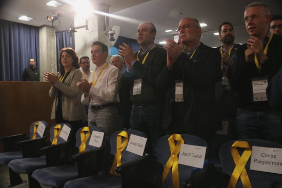 Some yellow ribbons in a PDeCAT party gathering remembering the officials in jail and abroad