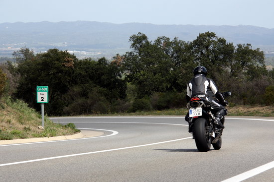 Easy rider. Motorcyclist on the motorway (by ACN)