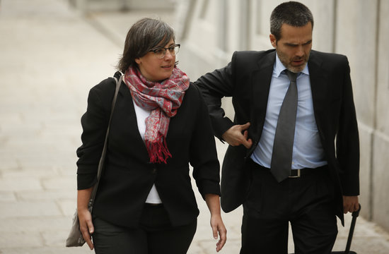 The former CUP MP Mireia Boya and her lawyer entering the Spanish Supreme Court