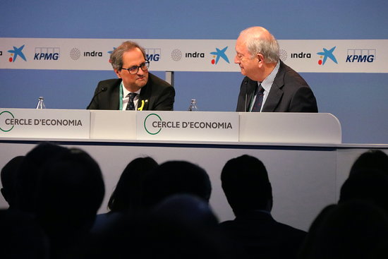 Quim Torra next to the president of the Cercle d'Economia Juan José Brugera on Thursday (by ACN)