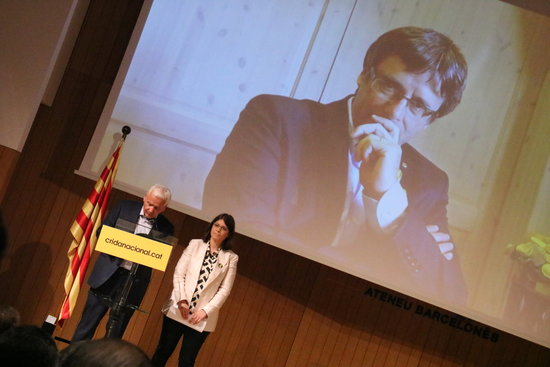 Former Catalan president Carles Puigdemont (on the screen) at the presentation of his new political party (by ACN)