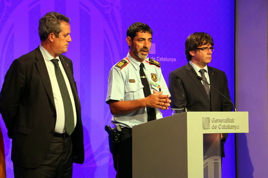 Former Catalan home affairs minister Joaquim Forn, former Catalan police head Josep Lluís Trapero and Catalan former president Carles Puigdemont on August 21, 2017, announcing that Younes Abouyaaqoub had been shot dead (by Pere Francesch)