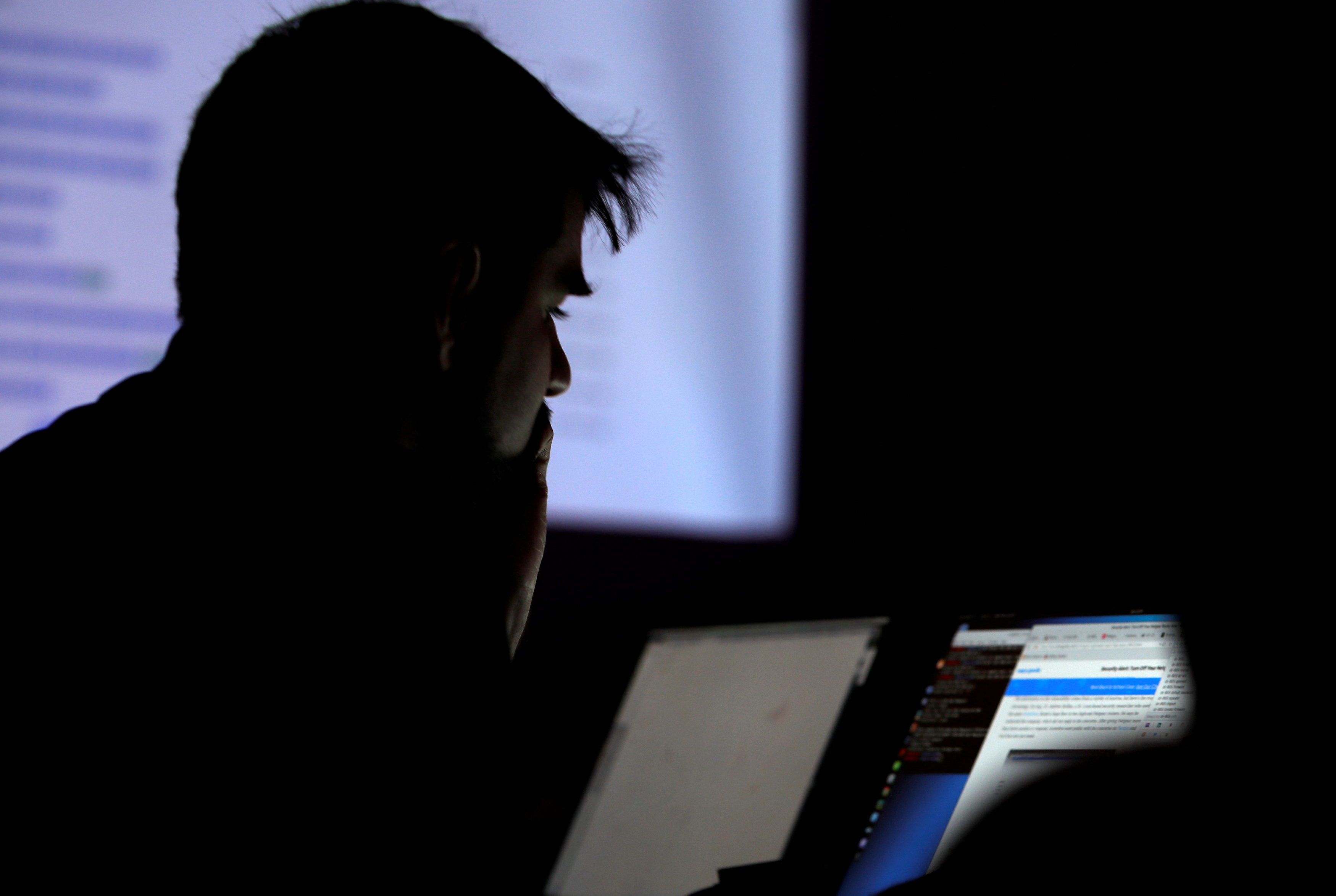 A man takes part in a hacking contest during the Def Con hacker convention in Las Vegas (REUTERS/Steve Marcus)