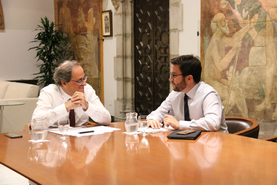 The president of the Catalan government, Quim Torra (left), with his second-in-command, Pere Aragonès (right), on October 5, 2018 (by Mariona Puig)