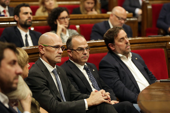 From left to right: former Catalan ministers Raül Romeva, Jordi Turull, and Oriol Junqueras (by Jordi Play)