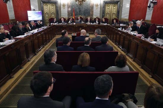 The 2017 Catalan leaders in the dock surrounded by judges and lawyers in the courtroom on the first day of their trial on February 12, 2019