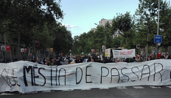 The platform 'What else must happen?' protesting on Gran Vía, Barcelona. (Photo courtesy of the 'What else must happen? platform.)