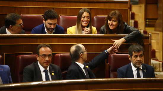 Josep Rull, Jordi Turull, and Jordi Sànchez sitting in the Spanish parliament (by ACN)