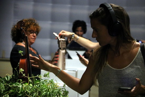 Sónar+D attendees interact with some exhibitions physically and through their phones in the 'immersive' area of the festival. (Photo: Pau Cortina)