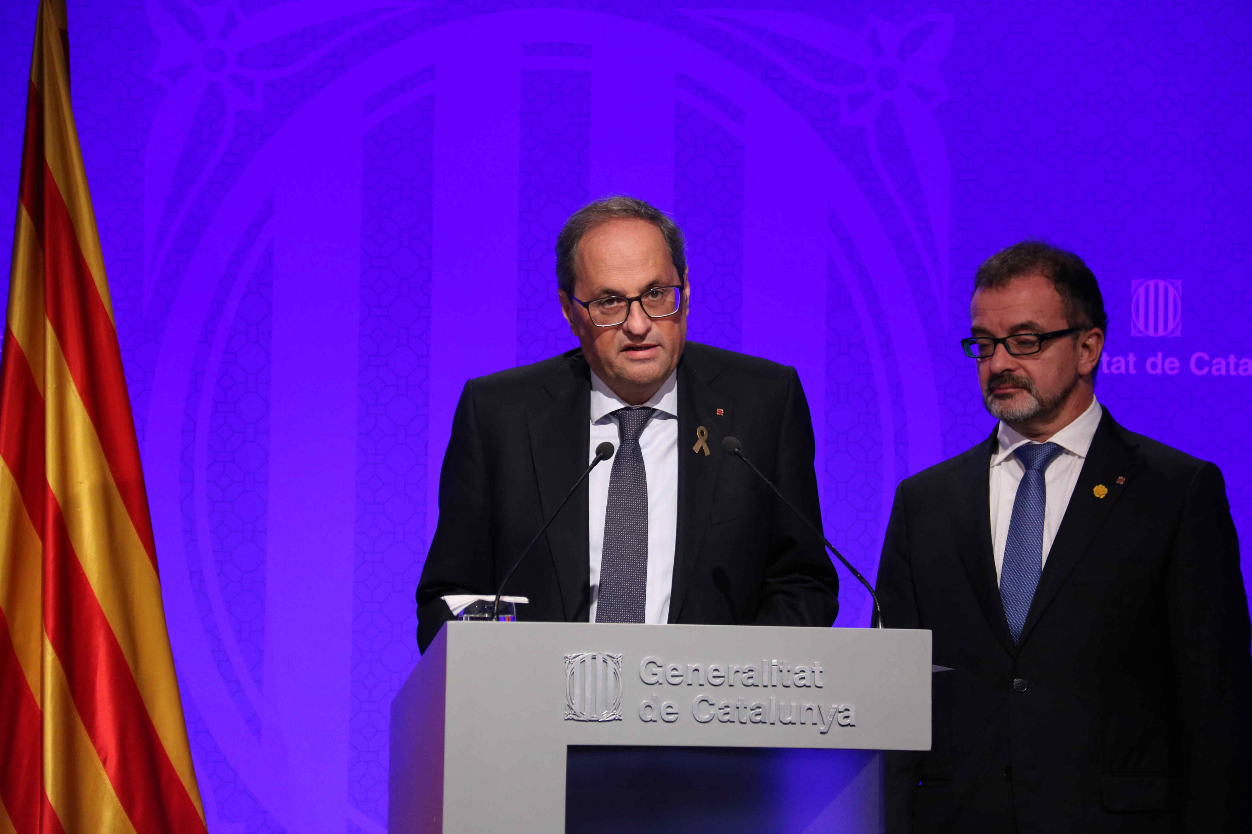 Catalan president Quim Torra (center) and foreign minister Alfred Bosch (by Alan Ruiz Terol)