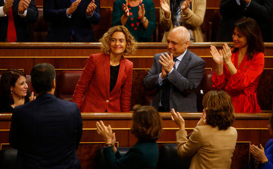 Socialist lawmakers cheer colleague Meritxell Batet as she is reelected as speaker of the Spanish congress (by Javier Barbancho)