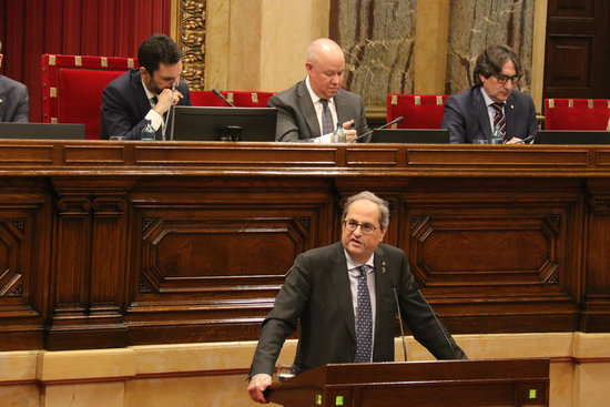 Image of the Catalan president, Quim Torra, offering a statement in parliament, with speaker Roger Torrent overseeing the session, on January 27, 2020 (by Mariona Puig)