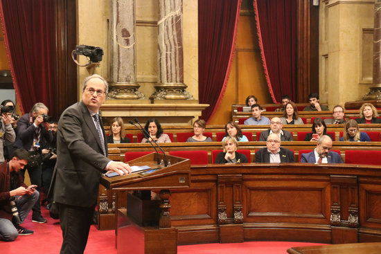 Quim Torra, president of Catalonia, turns to face speaker Roger Torrent (not pictured) during his speech in the plenary session on Monday, January 27, 2020 (by Mariona Puig)