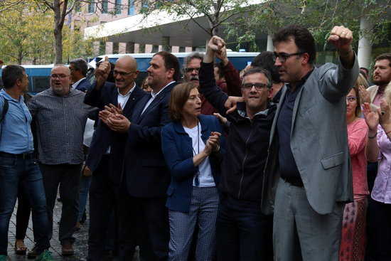 Josep Maria Jové and Lluís Salvadó stand with some colleagues now jailed for their roles in the 2017 independence push (by Pol Solà)