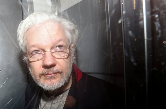 WikiLeaks founder Julian Assange leaving court in London, January 13, 2020 (by REUTERS / Simon Dawson / File Photo)