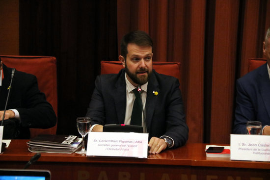 Catalonia's secretary of sport, Gerard Figueras, appears in Parliament (by Miquel Codolar)