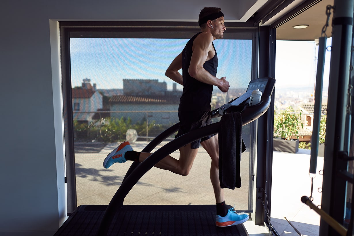 Triathlete Jan Frodeno running on his treadmill during his Ironman challenge in his Girona home, which has raised over €220,000 for health services during the coronavirus crisis (image courtesy of Laureus)
