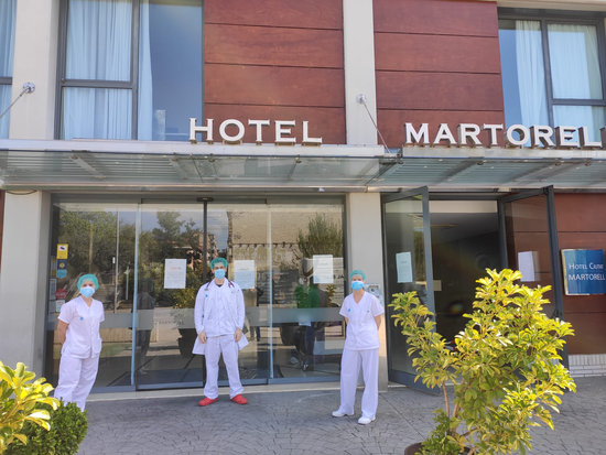 Medical professionals stand outside the Hotel Martorell, converted into a temporary hospital during the Covid-19 pandemic (image loaned by Catalan health department)