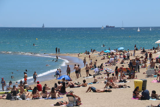 Barcelona's Barceloneta beach on June 13, 2020, the first day when bathing was allowed since the lockdown was enacted