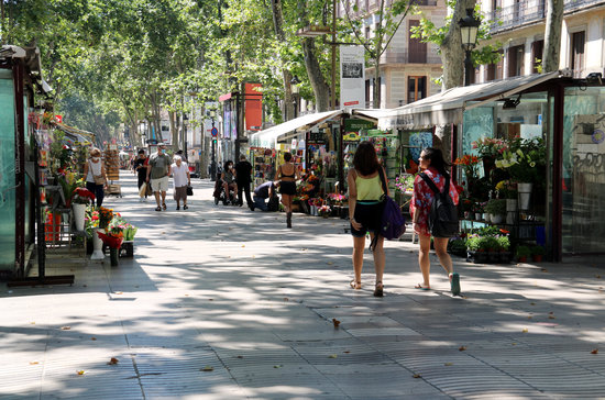 People strolling on Barcelona's La Rambla boulevard