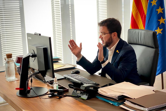 Vice president Pere Aragonès sits at his computer during a conference call in October, 2020 (image from vice president's office)