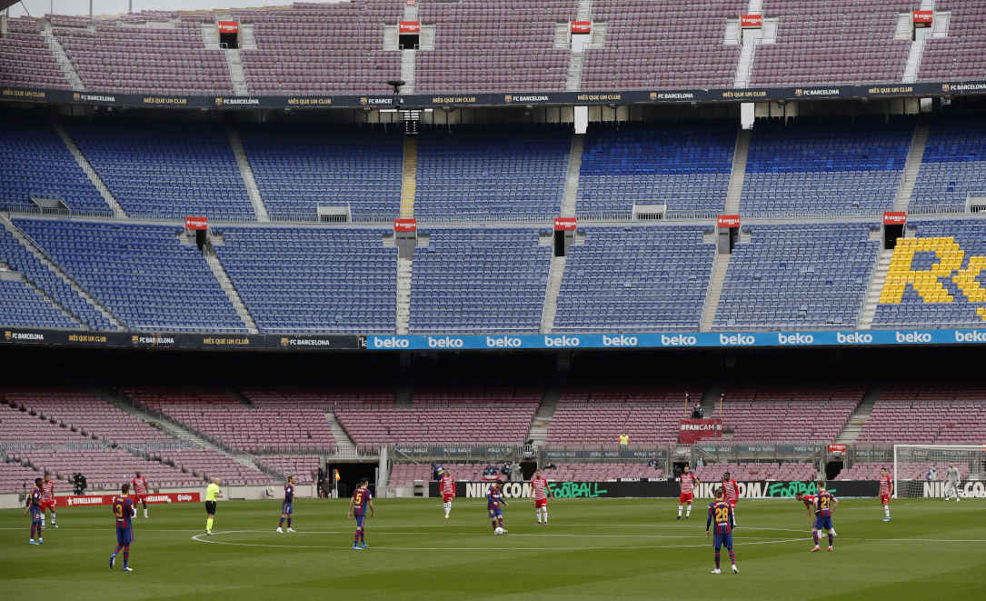 The empty stands of the Camp Nou stadium, as Barça take on Granada in La Liga (image by REUTERS/Albert Gea)