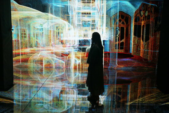 A visitor walks through one of the 10D multisensory exhibition spaces in Antoni Gaudí's Casa Batlló (by Pau Cortina)