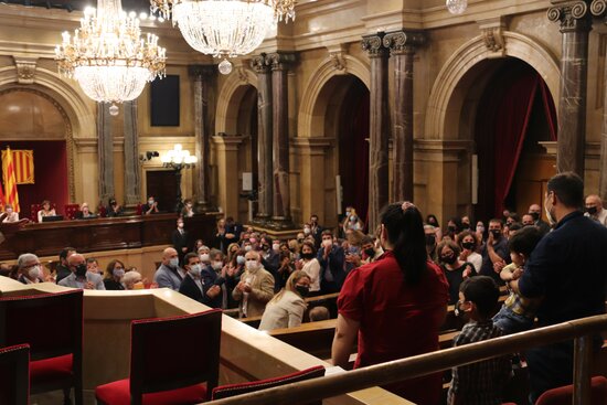 MPs stand to applaud Feridoon Aryan and his family, Afghan refugees. October 19, 2021 (by Maria Asmarat) 