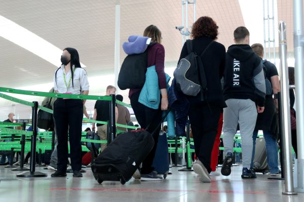 Passengers walking through Barcelona airport