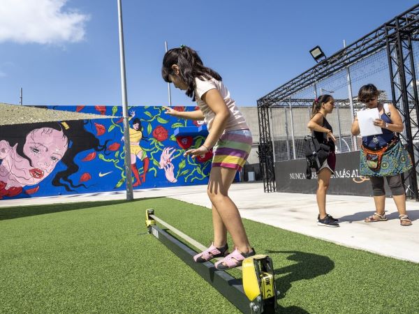 A child participates in summer camp activities organized by NGO Càritas (image courtesy of Càritas)