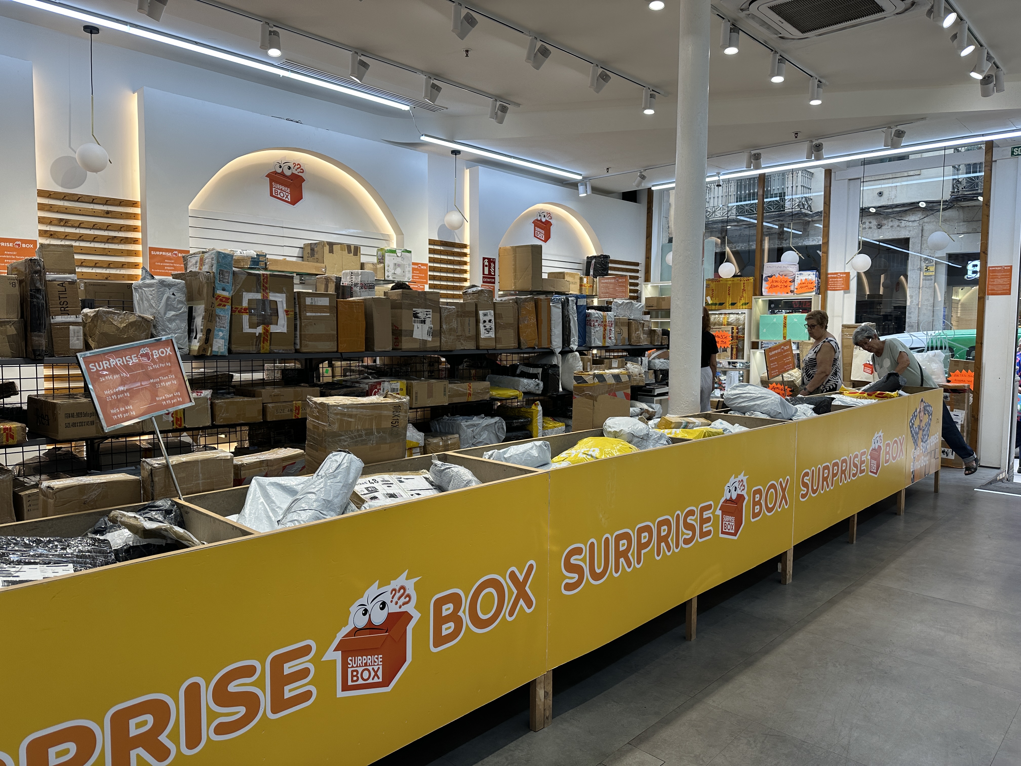 Aisles of undelivered, mystery packages at Surprise Box