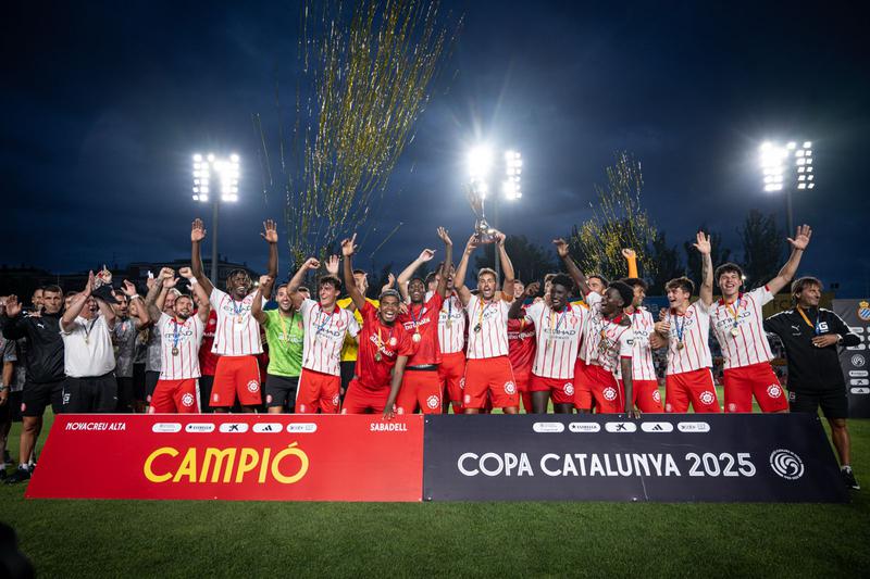 Girona FC lift the Copa Catalunya trophy after defeating Espanyol on penalties