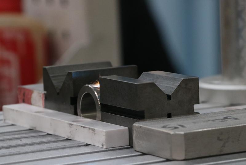 Parts being engraved in an industrial company that makes defence projects